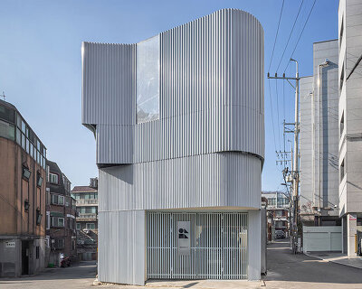 drawing works clads one-person house in seoul with layered corrugated steel facade