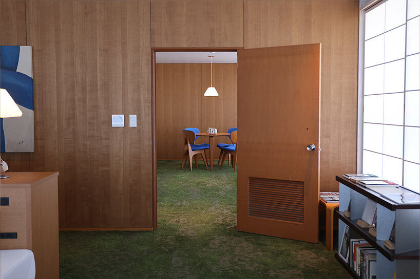 hakusen revitalizes modernist city hall into boutique hotel and public library in japan