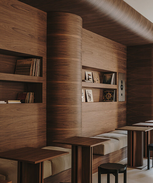 inspired by japanese listening bars, isern serra's JA? hifi café opens in barcelona