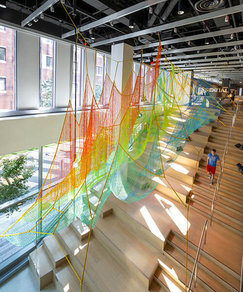 janet echelman suspends lightweight, woven installation within the MIT museum