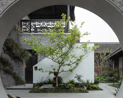 B.L.U.E. architecture studio converts historic chinese cinema into 'jiangnan house' hotel