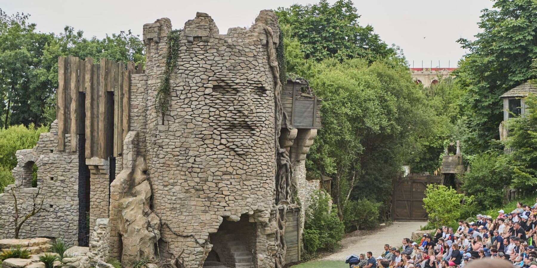 kinetic-sculpture-moving-face-tower-stonework-french-historical-theme-park-leva-designboom-1800-2