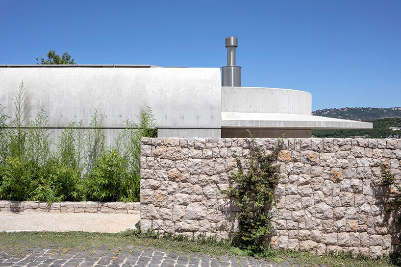 lebanon house by EAST architecture studio doubles as art gallery under sculptural roof
