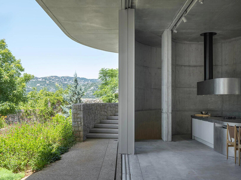 lebanon house by EAST architecture studio doubles as art gallery under sculptural roof