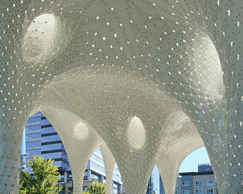 MARC FORNES / THEVERYMANY folds 6,665 aluminum parts into umbrella-like canopy