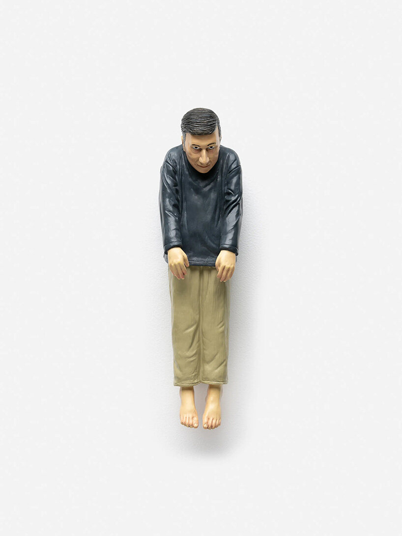 maurizio cattelan hides self-portrait miniatures across three cities for global treasure hunt