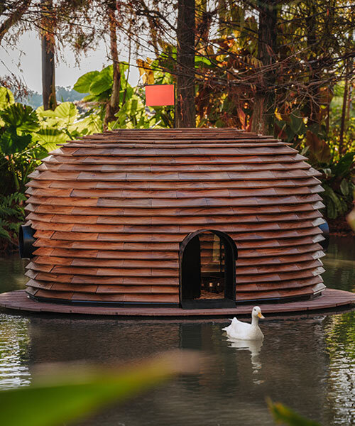 four floating wooden huts shape cheng tsung feng's duck nest installations