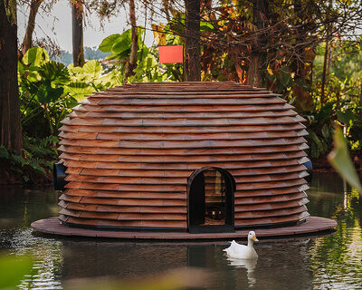 four floating wooden huts shape cheng tsung feng's duck nest installations