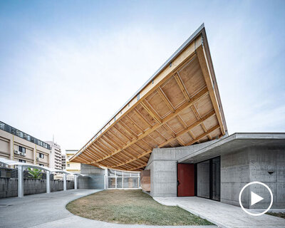 hyperbolic roof composed of curved timber slats tops concrete residence in taiwan