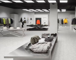 backlit metallic grid illuminates zara's hybrid retail space in rotterdam