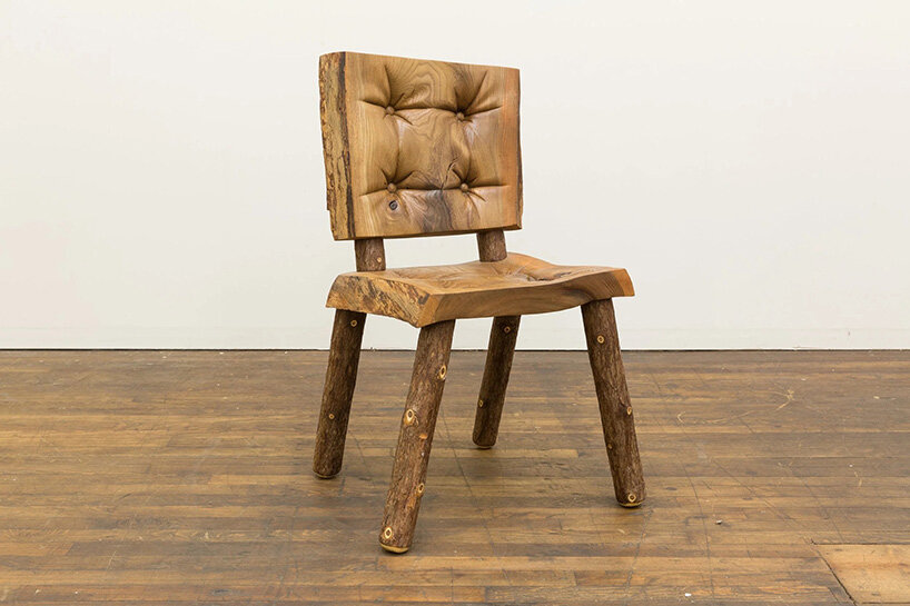 raul de lara carves surreal wooden sculptures to question who gets to belong