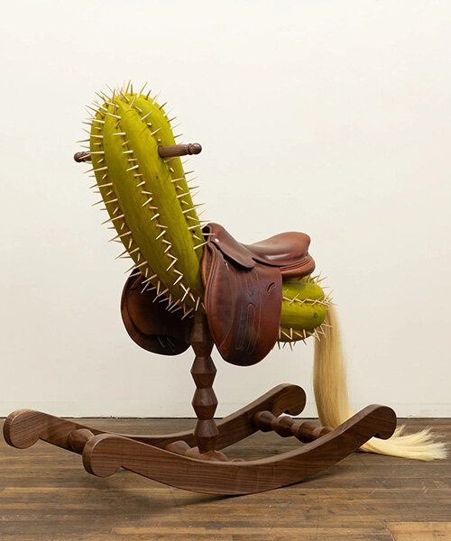 raul de lara carves surreal wooden sculptures to question who gets to belong