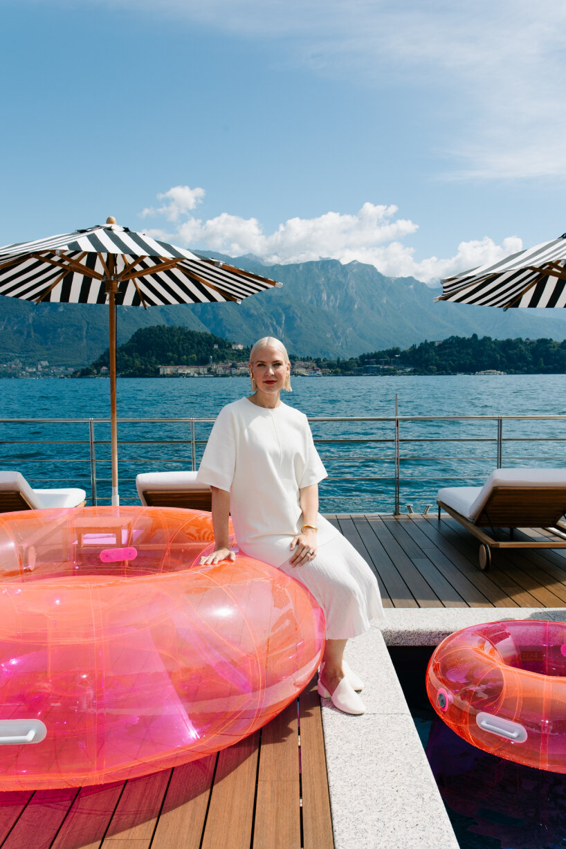 portrait of Sabine Marcelis sitting on her installation, Jelly Floats