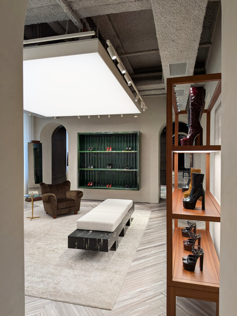 hand-shaped ceramic shelves foster the link of the Maison to Marrakech | image © designboom