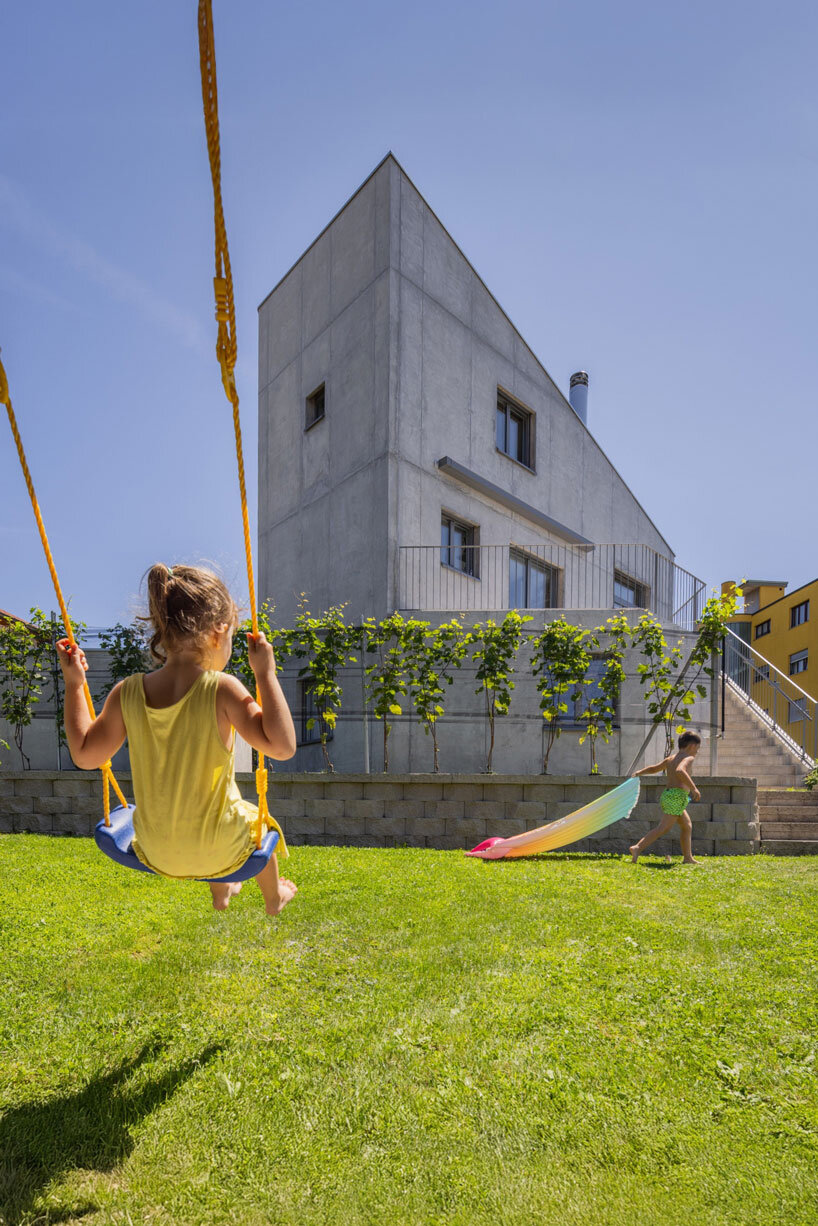 cuts and voids carve swisshouse xl's solid octagonal block by davide macullo architects