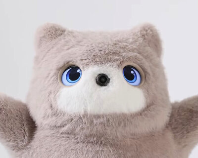 switchbot AI pet is a furry robotic teddy bear that talks to people and displays emotions