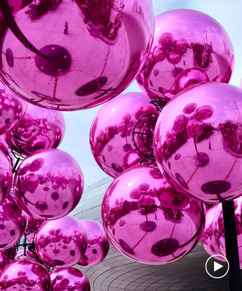 vincent leroy's kinetic cloud sculpture of glossy pink spheres hovers at seoul's design plaza