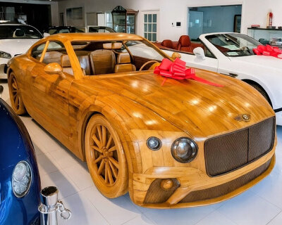 wooden bentley continental GT replicates the original car with sculpted gauges and speakers