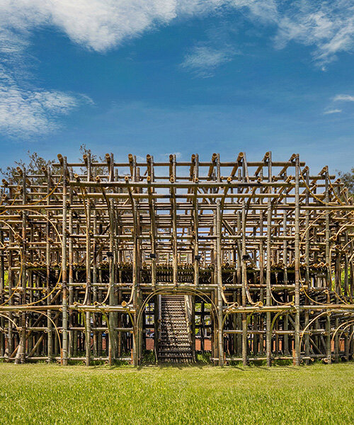 woven bamboo poles form cheng tsung feng's large-scale theatre installation in taiwan