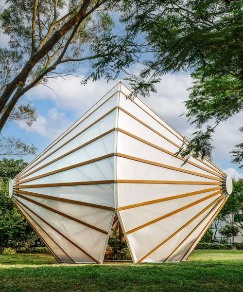 three angular canopies echo traditional oil-paper umbrellas in cheng tsung feng's installation