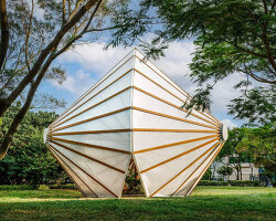three angular canopies echo traditional oil-paper umbrellas in cheng tsung feng's installation