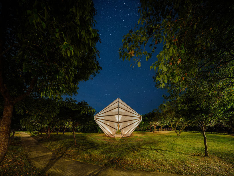 three angular canopies echo traditional oil-paper umbrellas in cheng tsung feng's installation