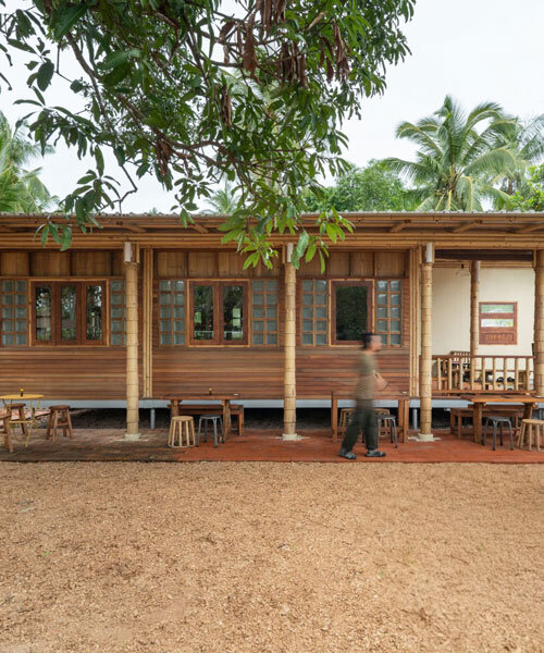 bamboo-clad ice cream shop tucks within coconut grove in thailand