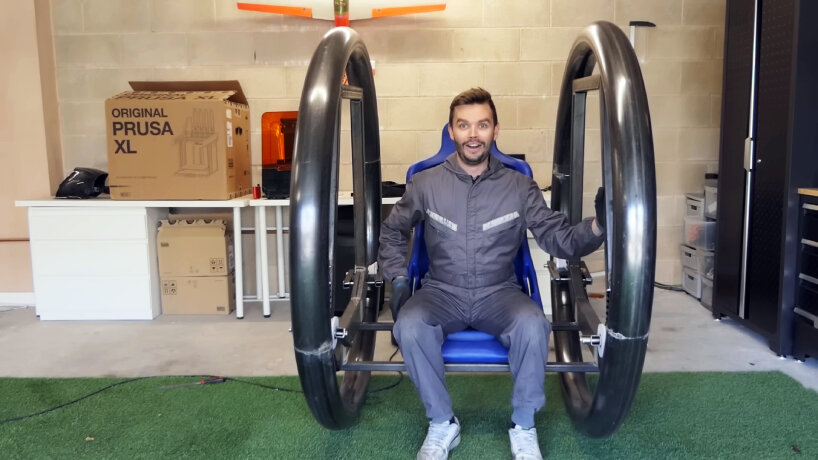 The seat is positioned low to keep the center of gravity near the bottom of the rings to make rolling easier