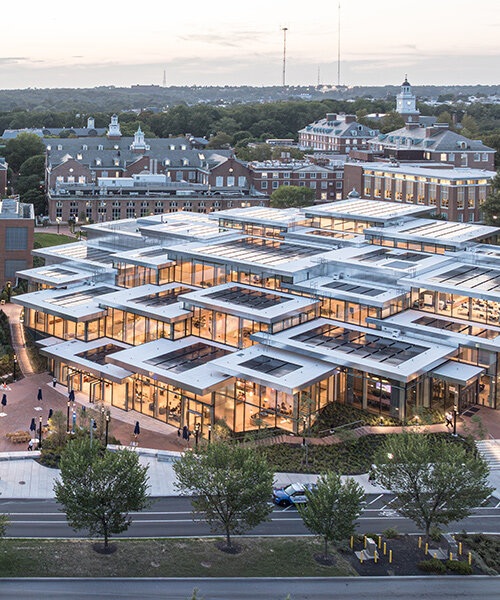 BIG & rockwell group design johns hopkins center as 'climbing village' of clustered boxes
