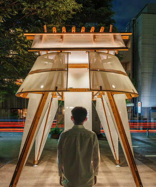 rhythmic layering of wood and fabric weaves sail-inspired installation by cheng tsung feng