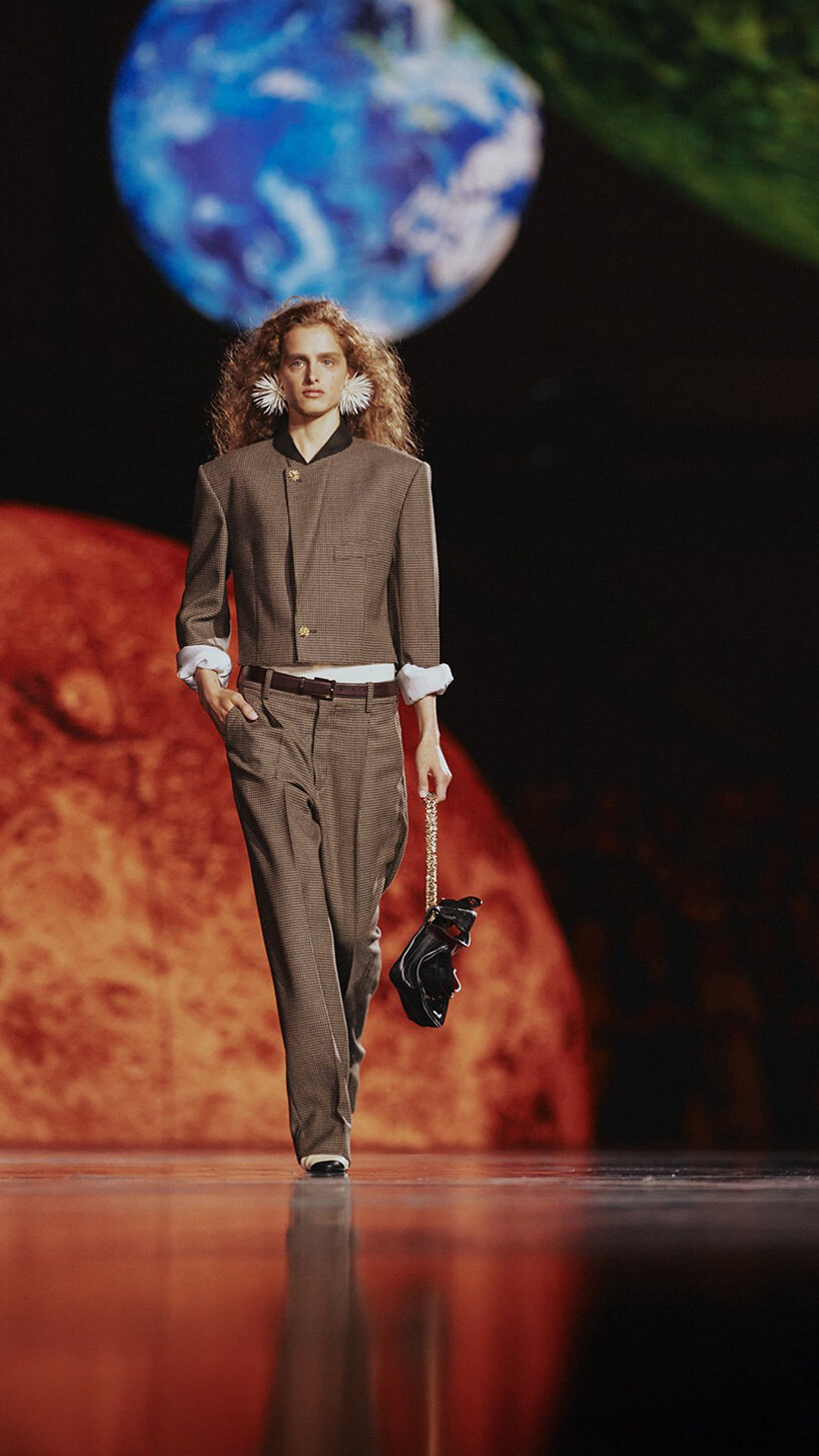 constellation of floating orbs illuminates paris's grand palais for chanel SS26 show