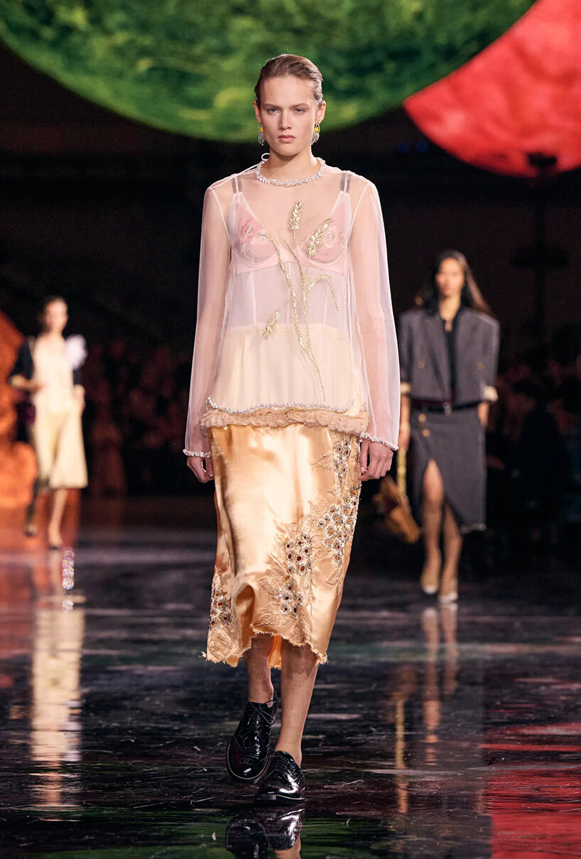 constellation of floating orbs illuminates paris's grand palais for chanel SS26 show