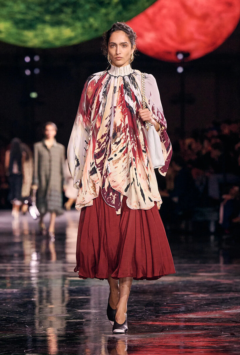 constellation of floating orbs illuminates paris's grand palais for chanel SS26 show