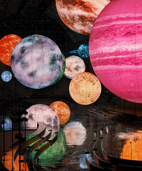constellation of floating orbs illuminates paris's grand palais for chanel SS26 show