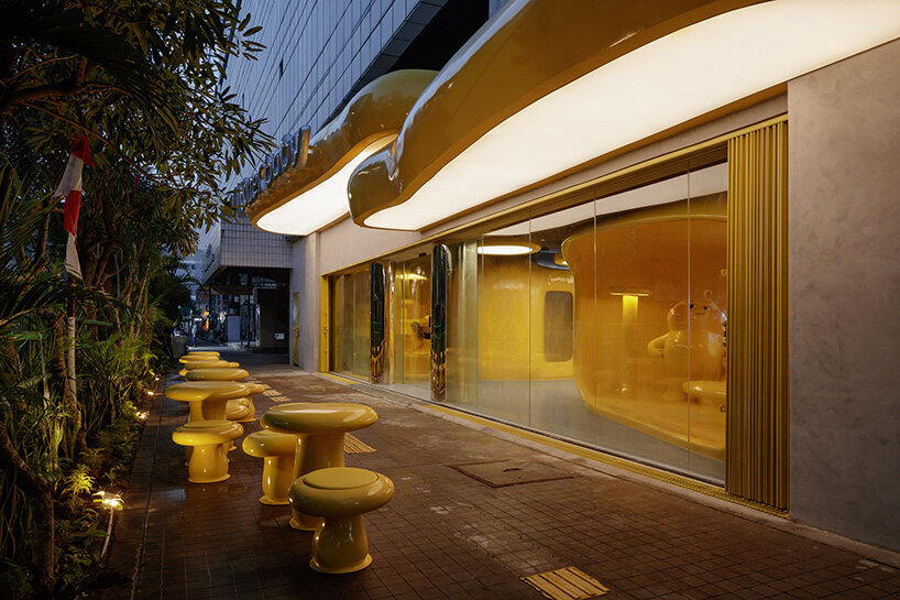crosby studios composes bright yellow alien habitat for dessert shop in jakarta