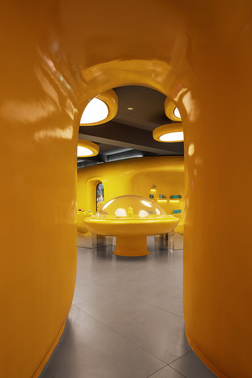 crosby studios composes bright yellow alien habitat for dessert shop in jakarta