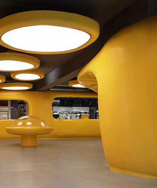 crosby studios composes bright yellow alien habitat for dessert shop in jakarta