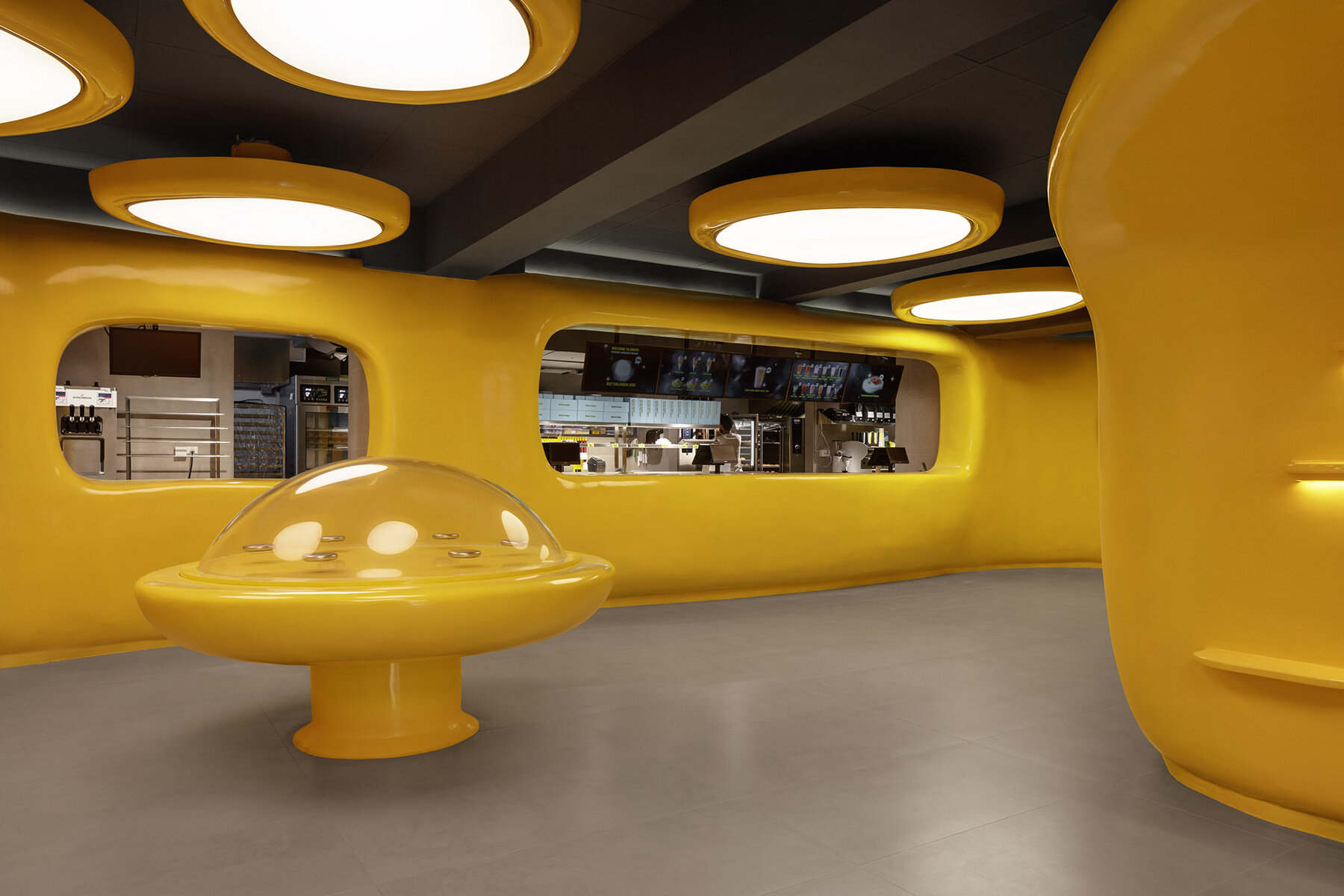 crosby-studios-bright-yellow-alien-habitat-dessert-shop-jakarta-butter-baby-designboom-large02