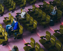 elmgreen & dragset craft hyperrealistic cinemagoer sculptures in prada mode installation