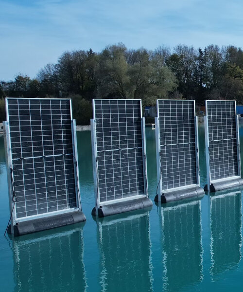 floating vertical solar panels capture sun’s energy from ponds, lakes, fish farms and lagoons