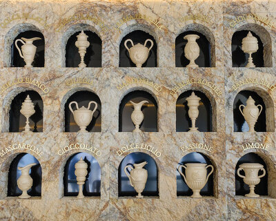 dessert-shaped sculptures in marble and wood ornament ice cream shop in argentina