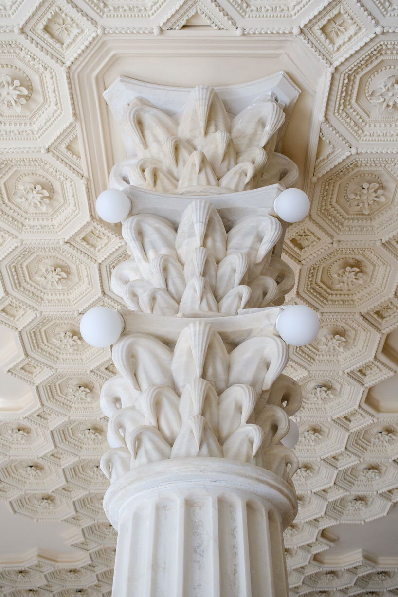 dessert-shaped sculptures in marble and wood ornament ice cream shop in argentina