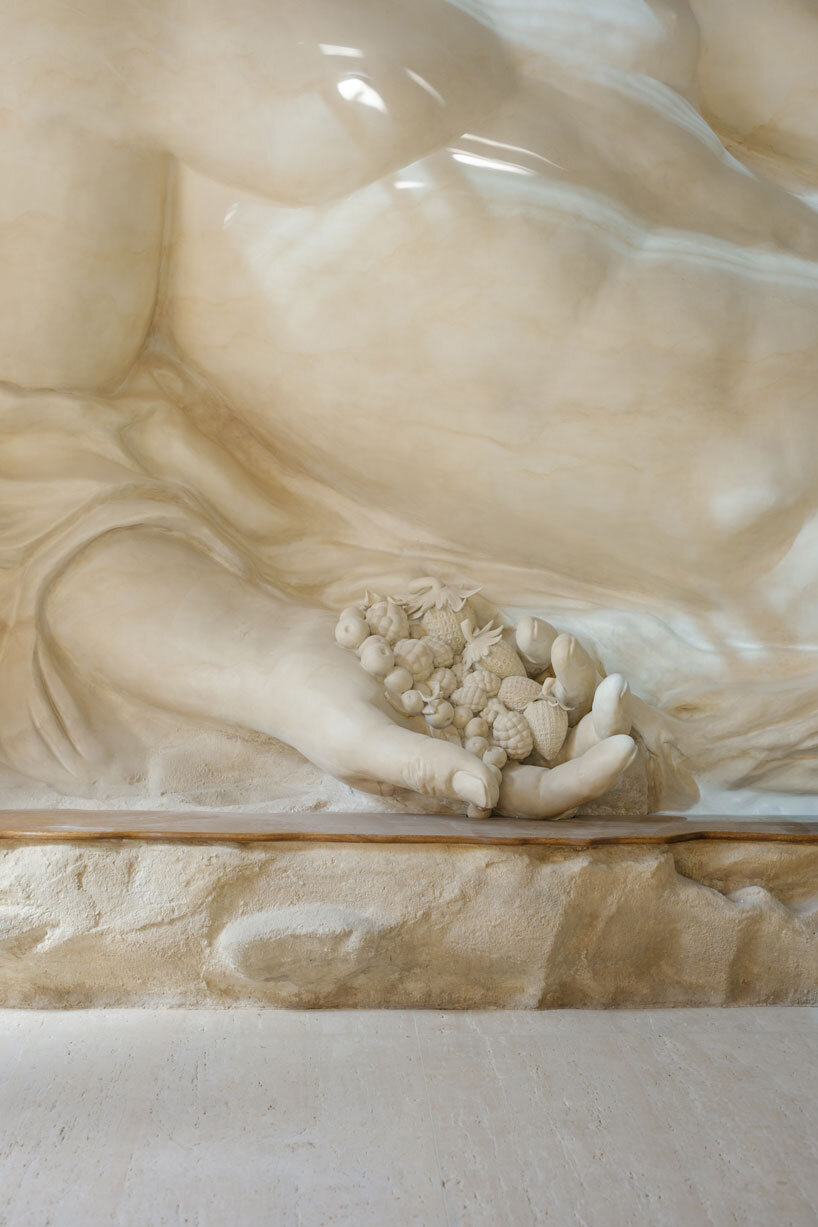 dessert-shaped sculptures in marble and wood ornament ice cream shop in argentina