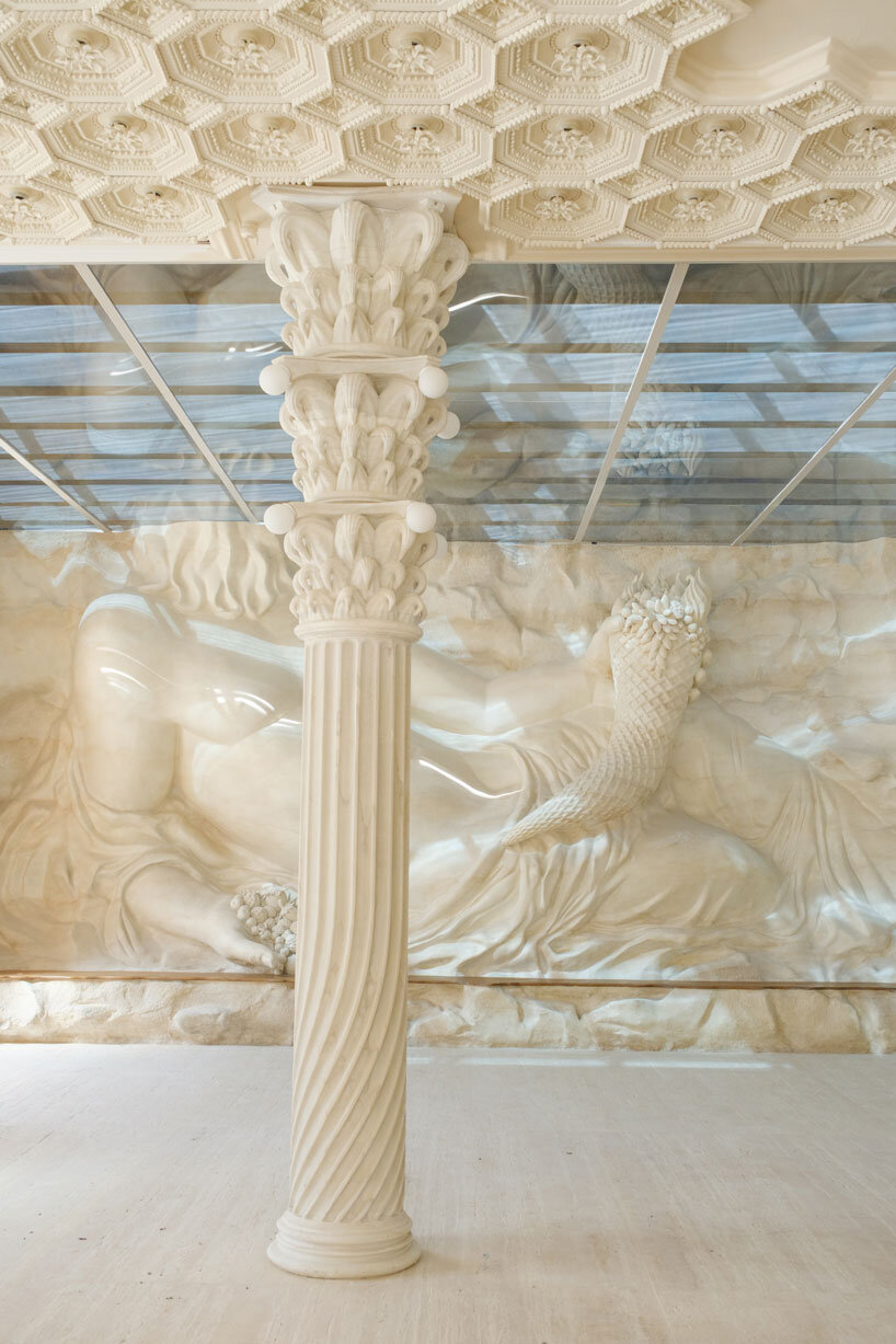 dessert-shaped sculptures in marble and wood ornament ice cream shop in argentina