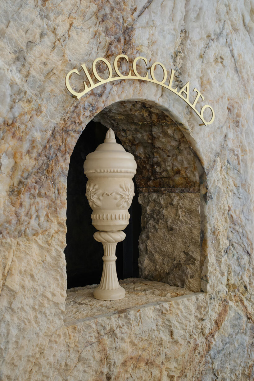 dessert-shaped sculptures in marble and wood ornament ice cream shop in argentina