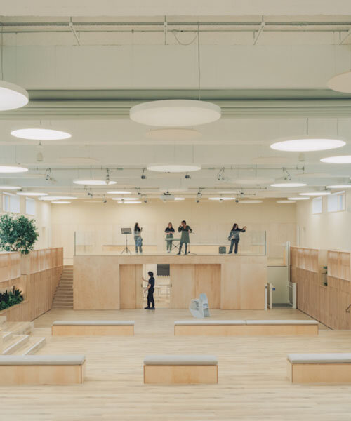 former swimming pool converts into multi-use timber education space for london college