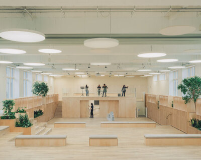 former swimming pool converts into multi-use timber education space for london college