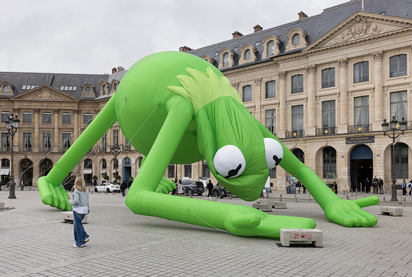 alex da corte's giant kermit the frog lands in place vendôme during art basel paris