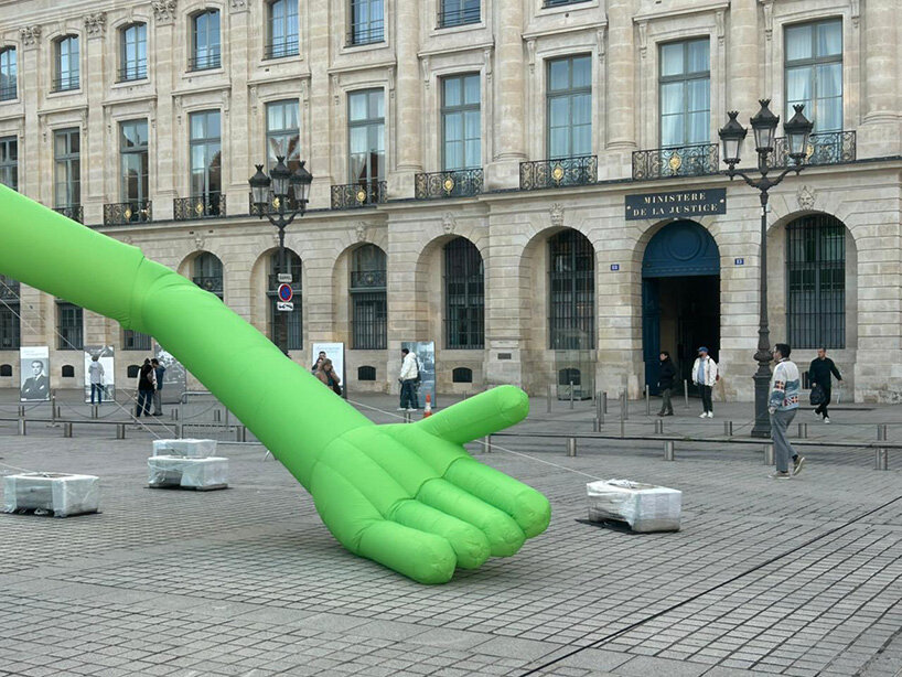 alex da corte's giant kermit the frog lands in place vendôme during art basel paris