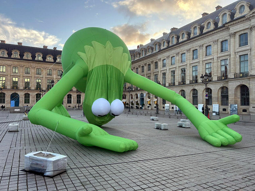 alex da corte's giant kermit the frog lands in place vendôme during art basel paris